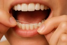 Você não precisa passar fio dental em todos os dentes